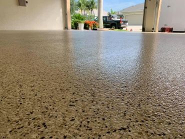 Epoxy flooring in a nice garage.
