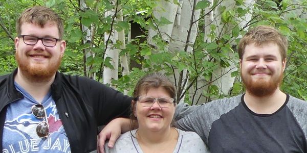 Linda and her sons, now adults.