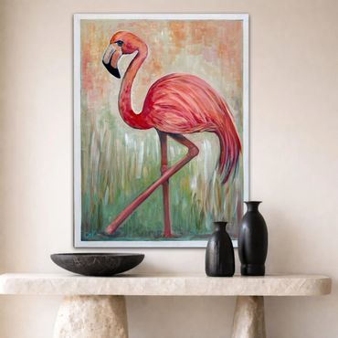 Vibrant flamingo painting displayed above minimalist stone table with decorative vases.