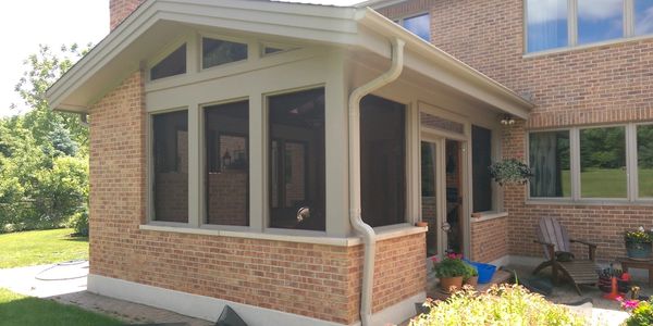 Screen porch with brick oven and removable screens.