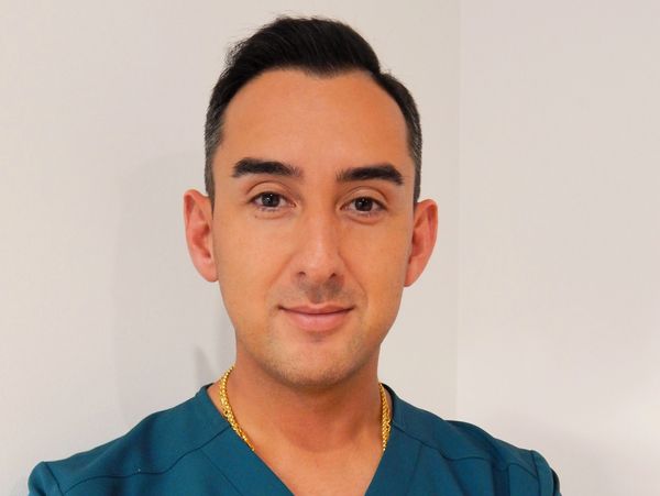 DR DAMIEN BEZZINA