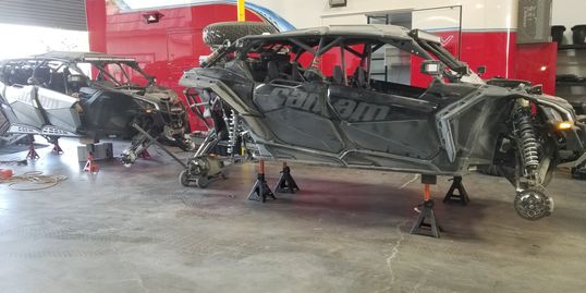 Canam Maverick turbo's getti g the full over before a long run in Mexico.