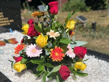 Flowers for a grave. Headstone Cleaning. Grave Tending near me. Grave Maintenance
