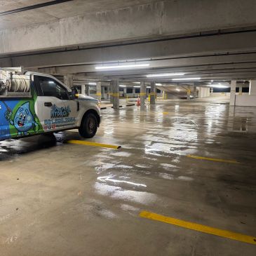 Pressure cleaning a commercial parking lot

