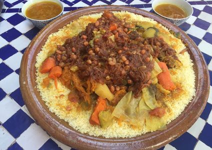 Couscous with caramelized onions, cinnamon & raisins with vegetable and beef. 
