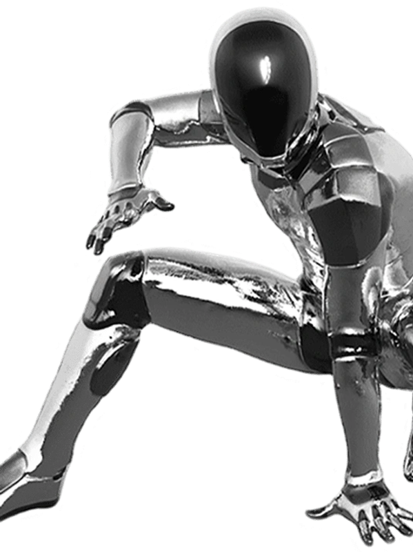 A shiny silver humanoid figure in a crouched pose.