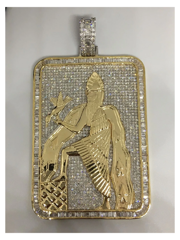 14k yellow gold pendant of Enki Sumerian God set with round and baguette diamonds. 