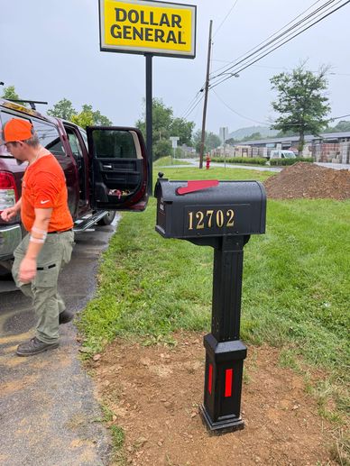 Mailbox with number 12702 near Dollar General store.