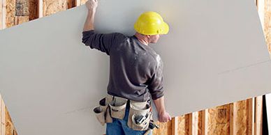 noble drywall installation crews hanging drywall boards 