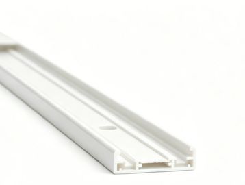 White plastic rail or track against a white background.