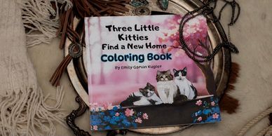 Children's coloring book titled 'Three Little Kitties Find a New Home' with cat illustrations.