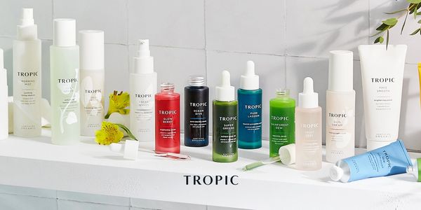 Tropic Skincare products lined up on a shelf