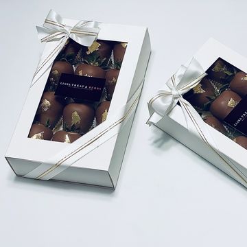 Dark chocolate covered strawberries with gold leaf