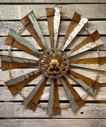 Windmill, 24" (5" depth)
beaded and embellished vintage parts

