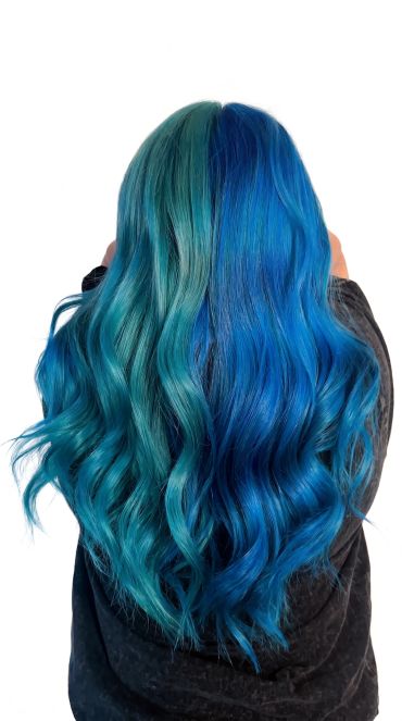 Long wavy hair dyed in two shades of blue.