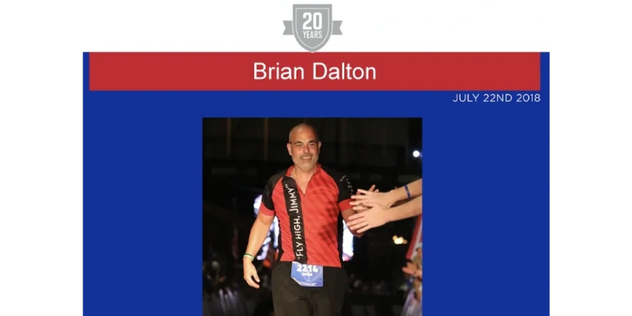 Brian Dalton finishing the 2018 Lake Placid Ironman.