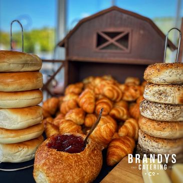 Delicious croissants being served from a barn for a catered event