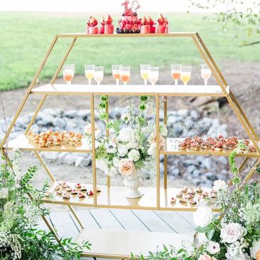 Elegant hors d'oeuvre display with a variety of appetizers for catering