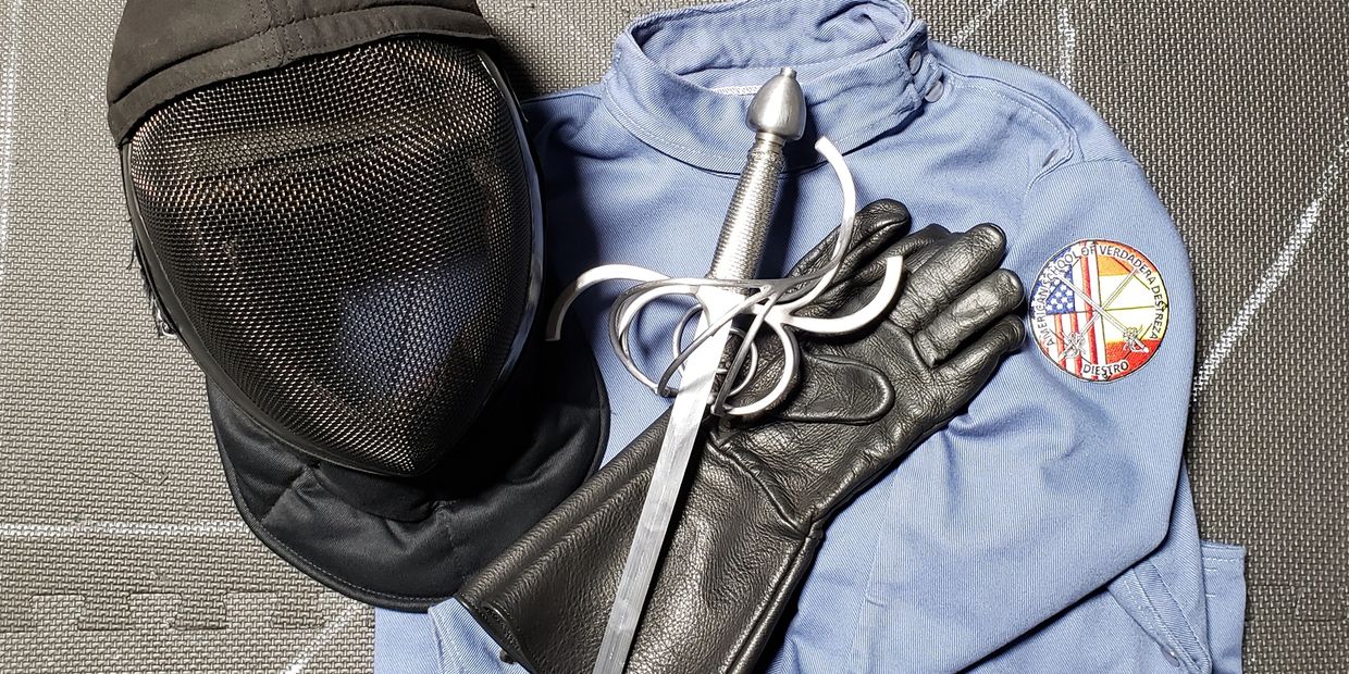 Fencing mask, jacket, gloves and rapier