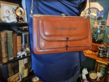 1970s Hard Tan Leather Shoulder Bag with Black Cross Charm 