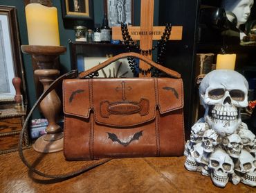 1970s Tan Leather Bat and Cross Satchel Bag