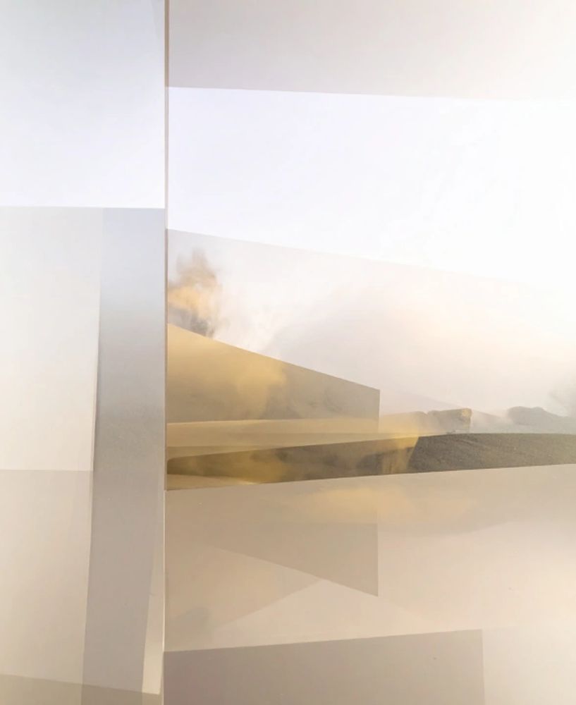 Abstract geometric shapes with soft, muted gold and beige tones.