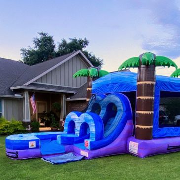Smaller kid's tropical inflatable bounce house with water slide combo unit