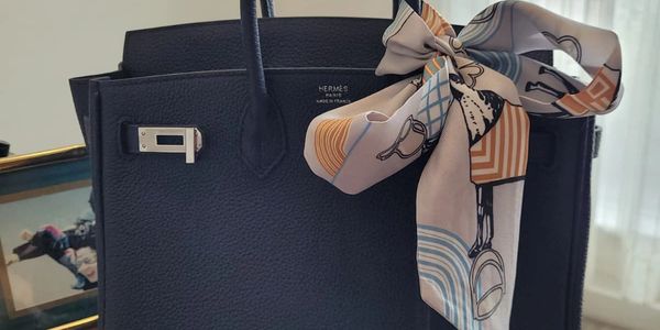 a bellelux black satchel in togo leather