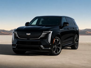 Black luxury SUV with modern LED lights.