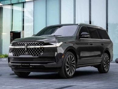 Black Lincoln Navigator SUV parked in front of a modern glass building.