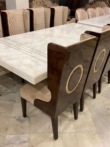 Elevate Your Dining Experience with Om Art and Craft's Best Quality Marble Dining Tables
