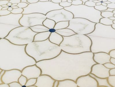 "Mastering the Art of Inlay: Om Art and Craft's Exquisite Creations in Corian, Marble, and Wood"