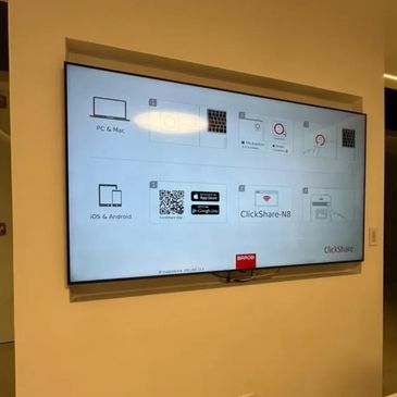 A screen displays ClickShare instructions for PC, Mac, iOS, and Android.