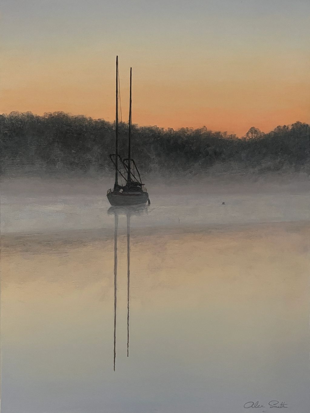 Sailboats in the morning fog.