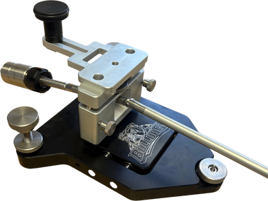 Precision tool with metallic components on a black base.