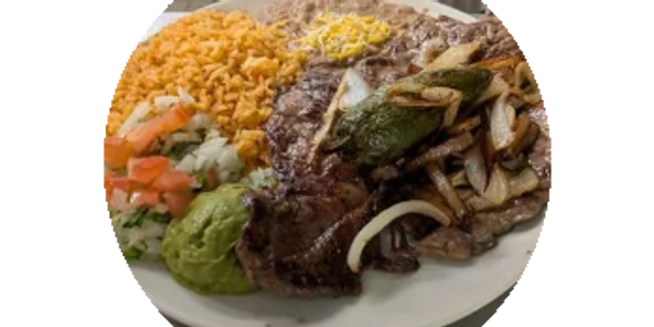 Carne Asada Steak Plate with refried beans and rice, grilled onions, and a poblano pepper.