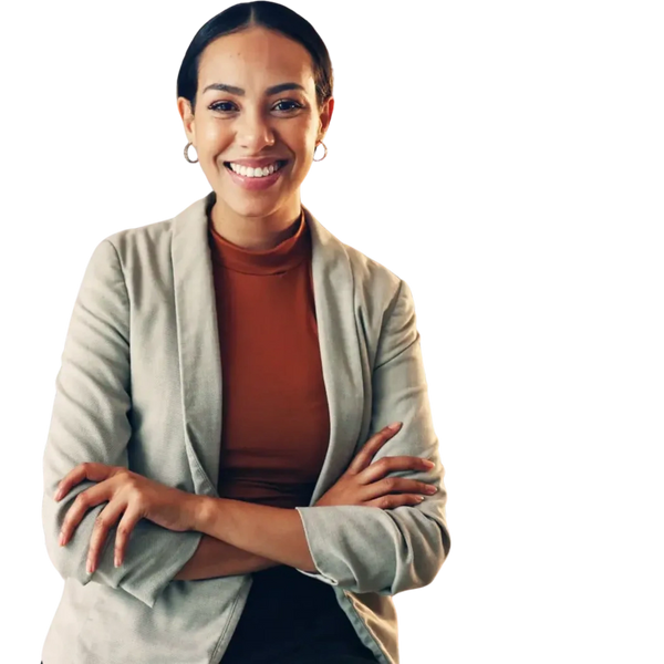 Confident businesswoman standing with arms crossed on a plain background.