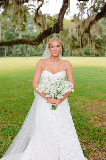 Charleston bride smiling with radiant natural bridal makeup