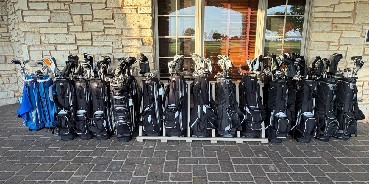 A fleet of rental golf clubs staged for a Chicago golf outing
