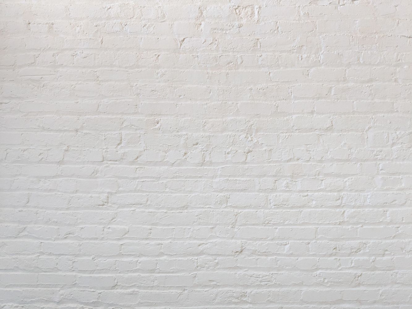Brick wall painted white
