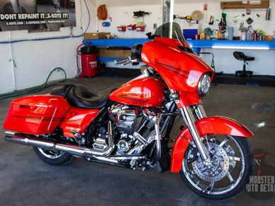 A red motorcycle sitting in the Mobster Auto Detail shop in Johnson City, TN.