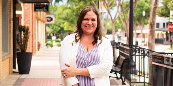 Cristina C Fox standing on sidewalk , woman posing on sidewalk for branding photos