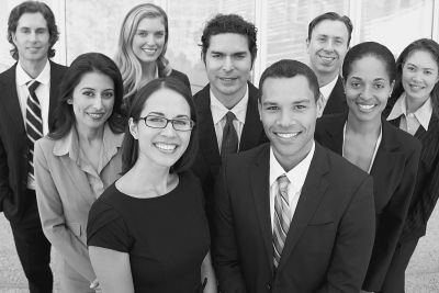 Group of diverse business professionals smiling.