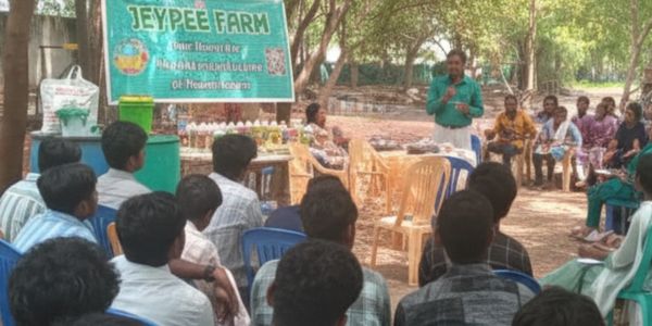 Outdoor educational session at Jeypee Farm with attentive audience.