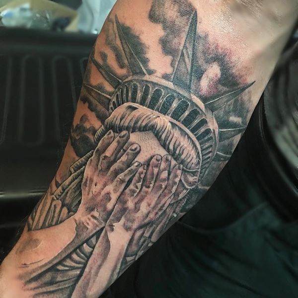 Statue of Liberty tattoo by Steve Santacruz