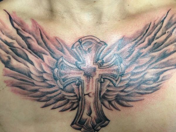 tattoo cross on the chest