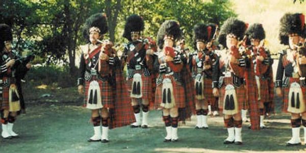 The Morton Highlanders in full dress uniforms.