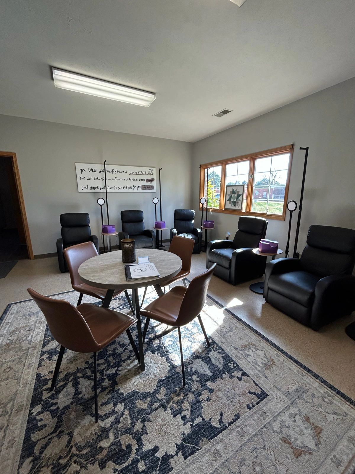 Recliners and a round table in the IV lounge at our Covington clinic