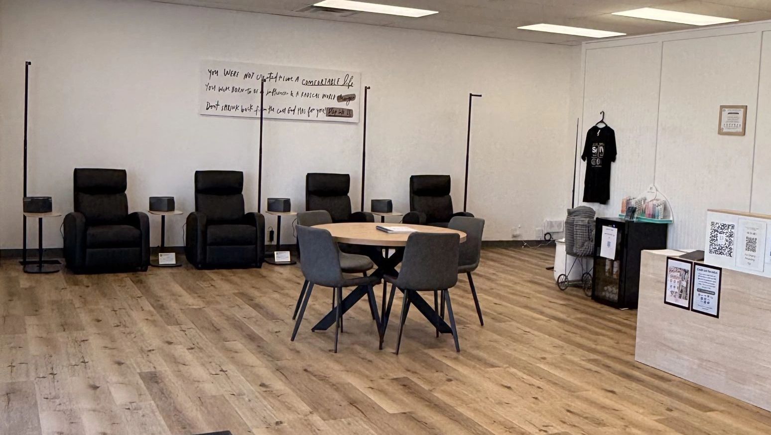 Recliners, a round table and our wall quote at our Rockville clinic