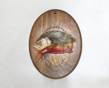 Taxidermy fish with claws